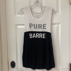 Pure Barre tank in black & white with deep arm holes.  Size Small